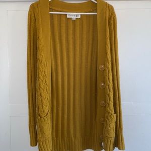 yellow cardigan